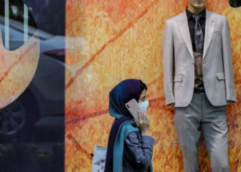 As the hejab goes, the necktie begins its comeback across Iran