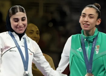 Olympian Quietly Ousted from Team for Embracing Defector